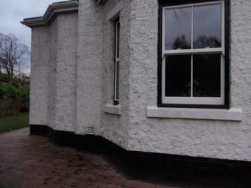 Mr & Mrs A. Bygone Collection sliding sash windows, double glazed krypton glass, bespoke black outer frames. full mortice look jointing upvc sliding sash windows Liverpool. In white